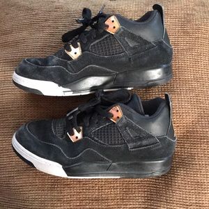 Jordans size 3youth black with little bits of gold